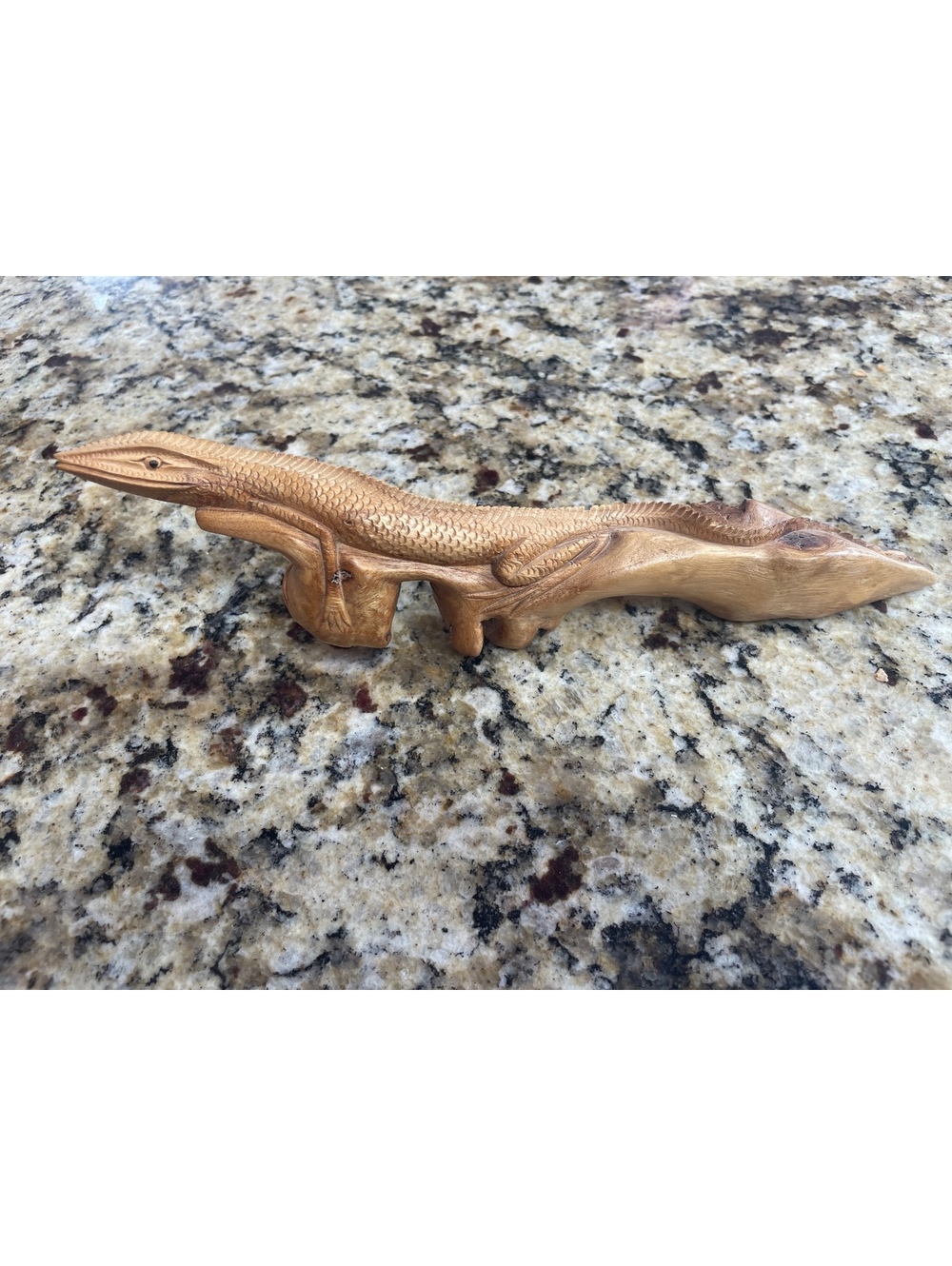 Hand carved wooden lizard